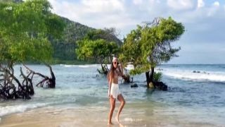 Camila Luna alone on the beach