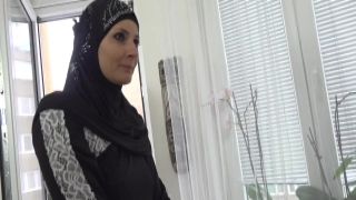 Hot Muslim woman doing extra cleaning